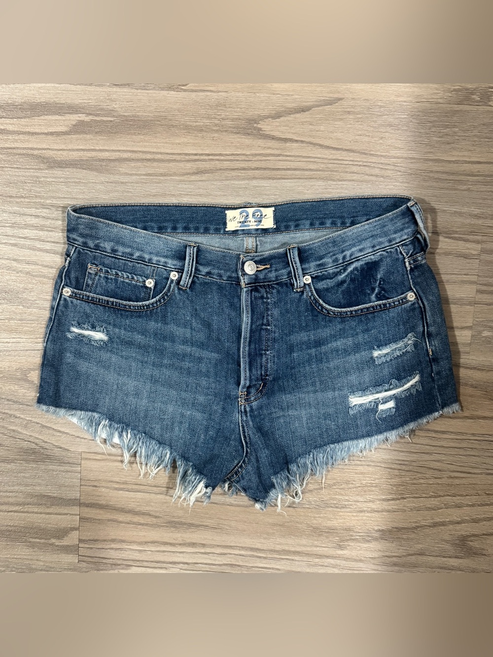 Free People We The Free Distressed Denim Shorts Raw Hem Size 29